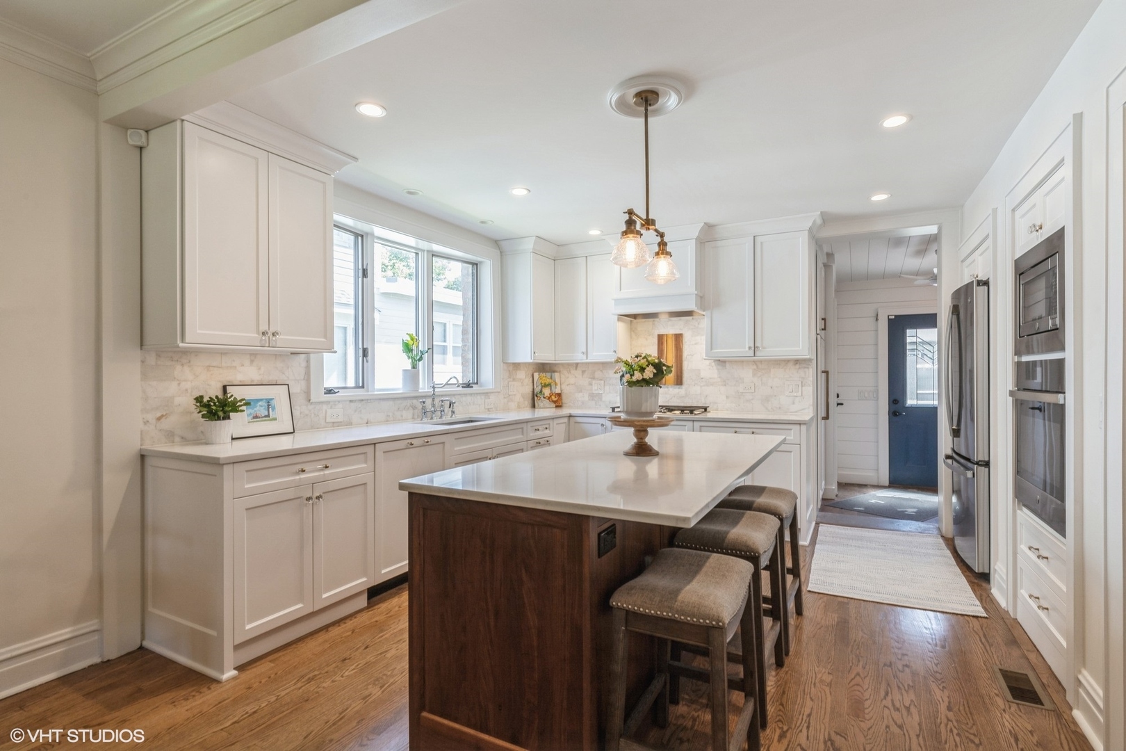 613 South Prospect Avenue Park Ridge, IL 60068 - Photo 6 of 29 a kitchen with sink cabinets and wooden floor