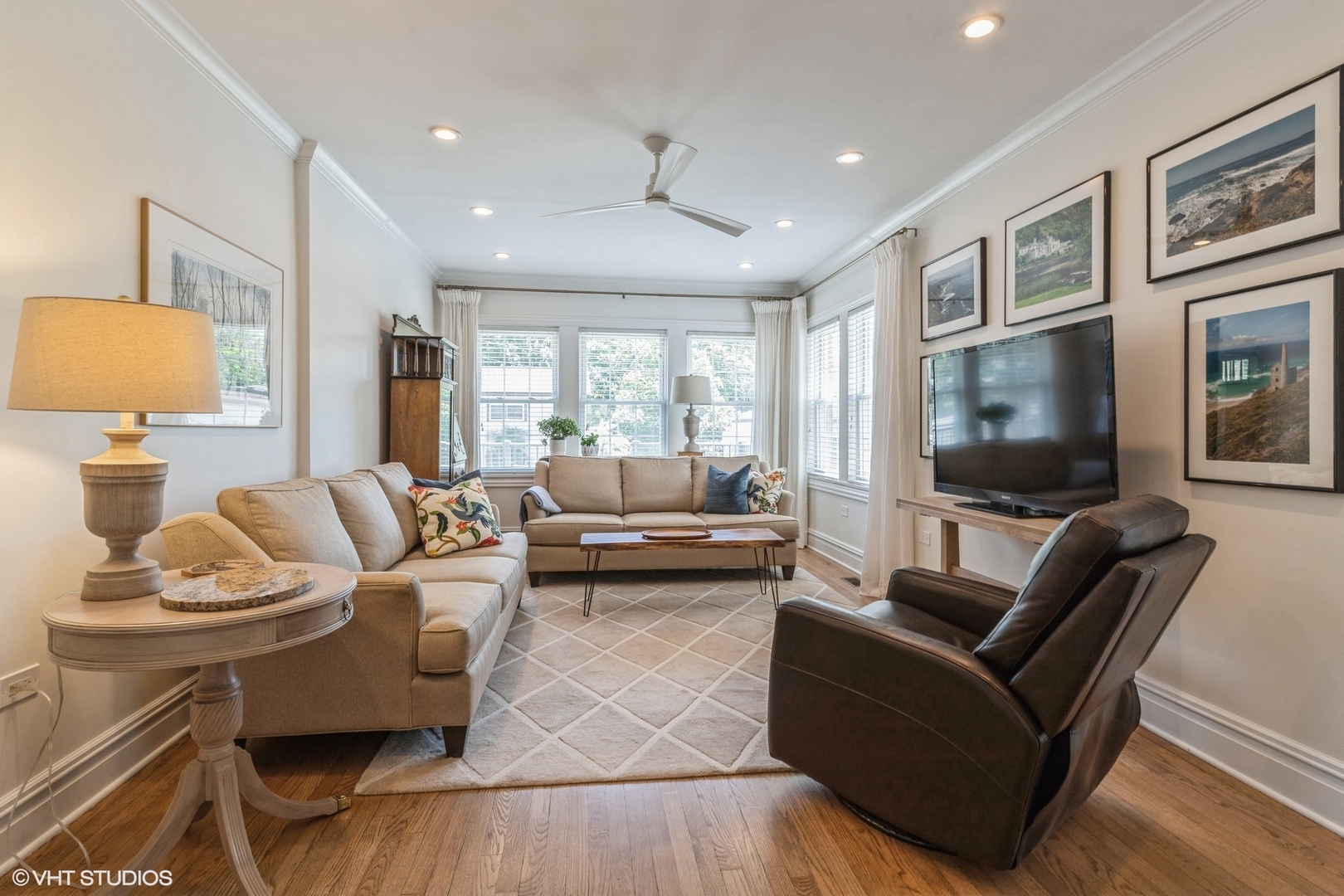 613 South Prospect Avenue Park Ridge, IL 60068 - Photo 9 of 29 a living room with furniture and a flat screen tv