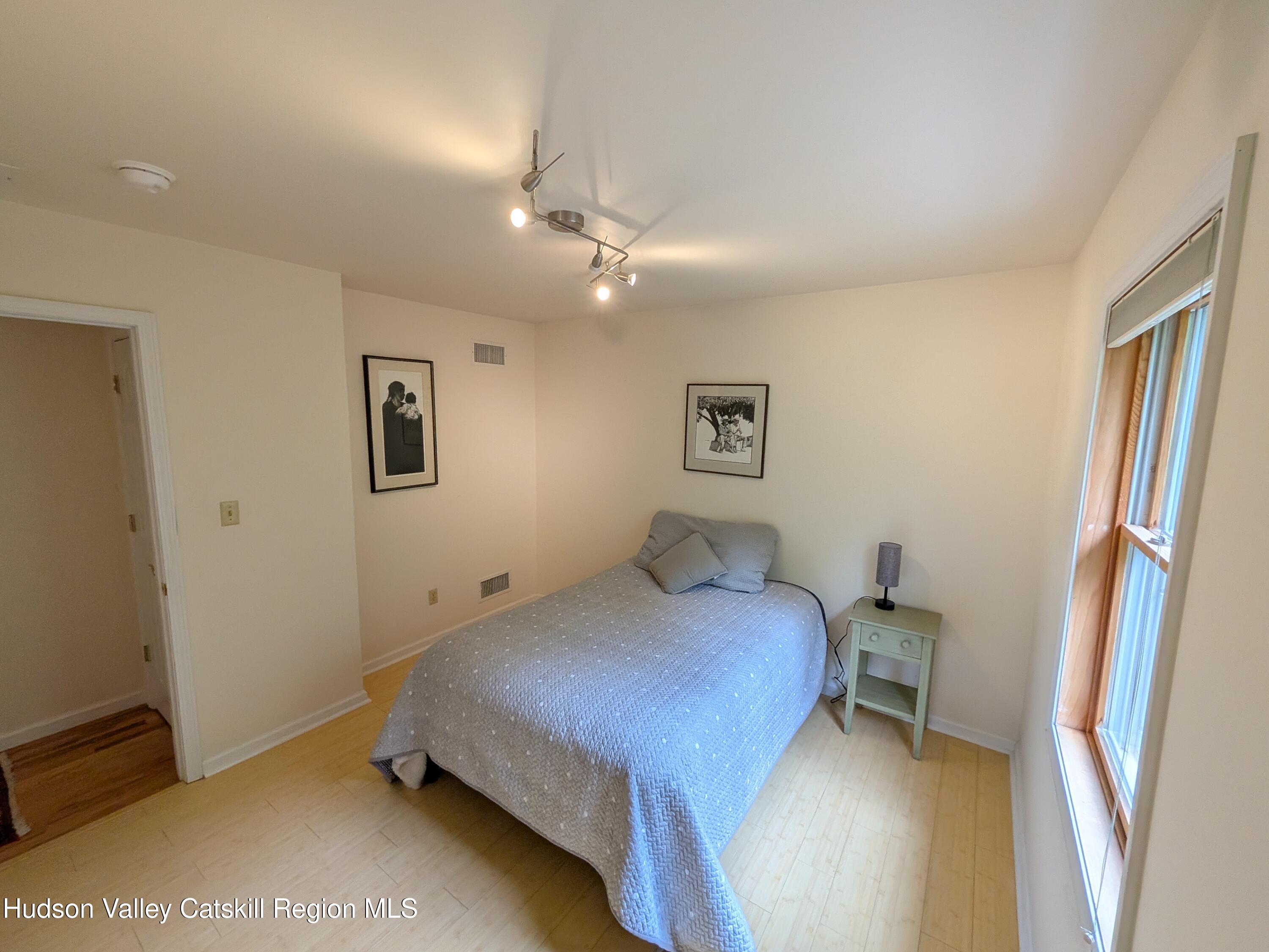 513 South Mountain Road Gardiner, NY 12525 - Photo 24 of 63 a bedroom with a bed and a window