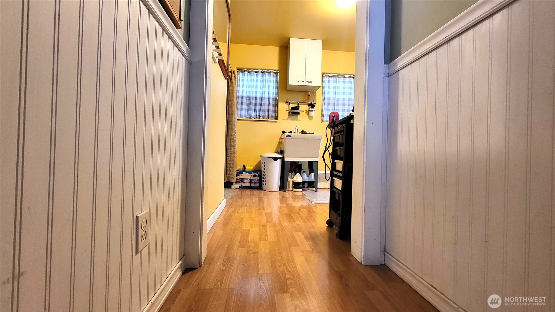 1113 South County Road Warden, WA 98857 - Photo 11 of 40 a view of a living room with furniture and wooden floor