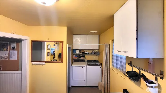 a view of a kitchen with a sink
