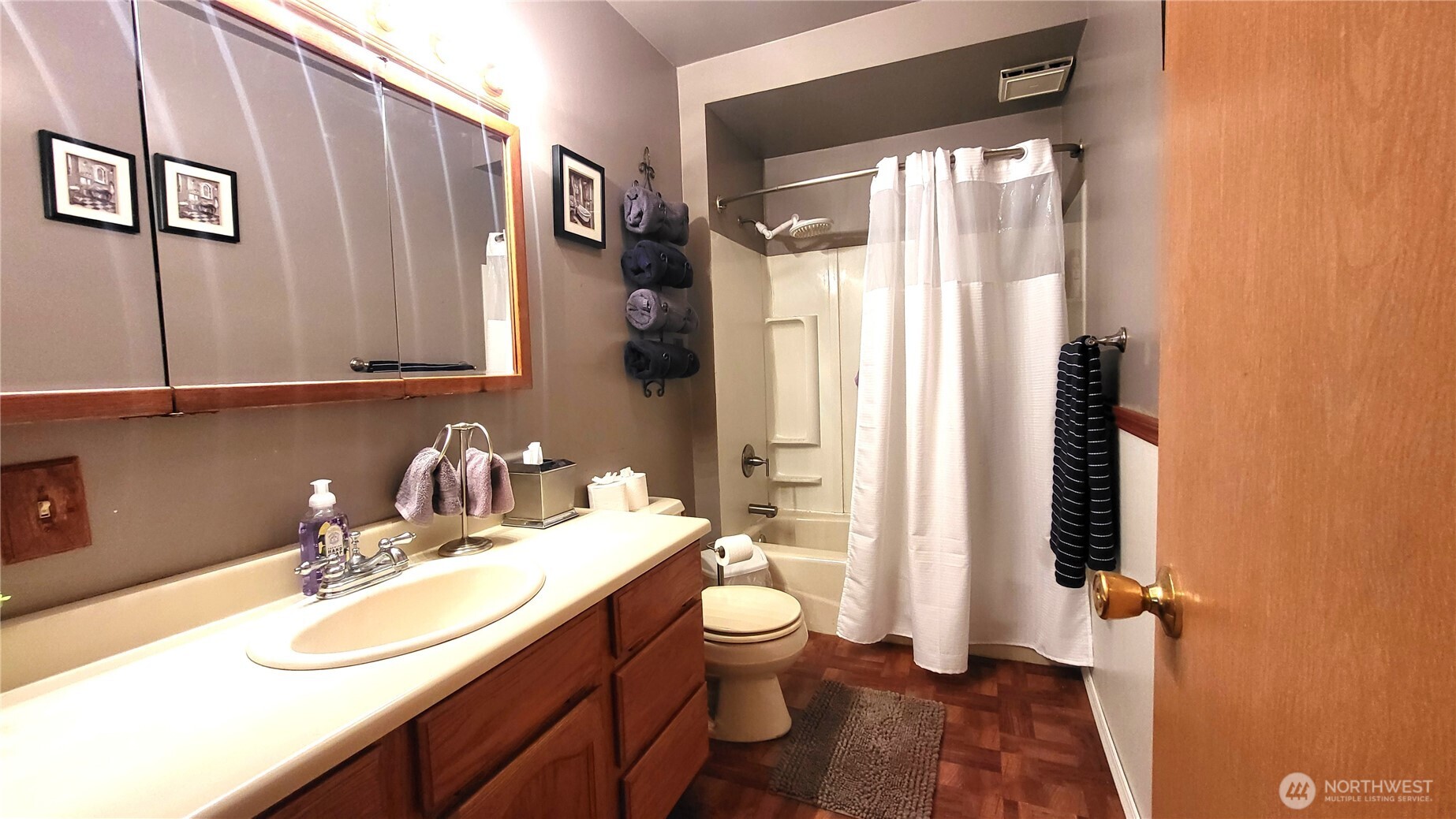 1113 South County Road Warden, WA 98857 - Photo 13 of 40 a bathroom with a granite countertop sink toilet and shower
