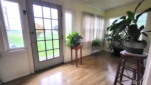 a view of livingroom with furniture and a window