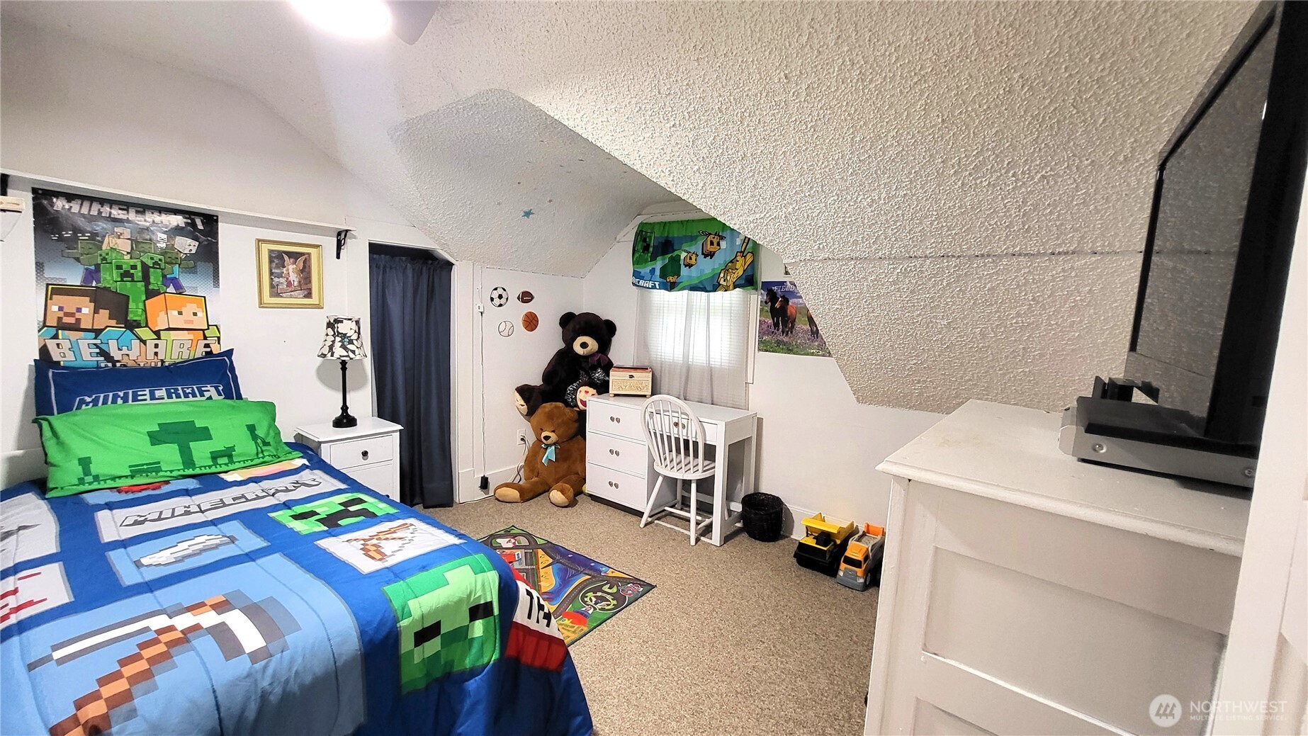 1113 South County Road Warden, WA 98857 - Photo 26 of 40 a bedroom with a bed and a desk