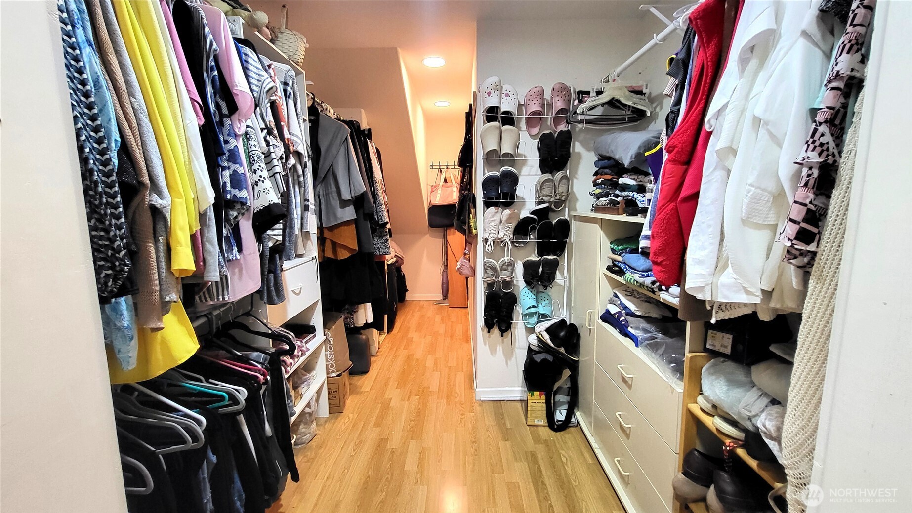 1113 South County Road Warden, WA 98857 - Photo 27 of 40 a view of walk in closet with clothes and shoes