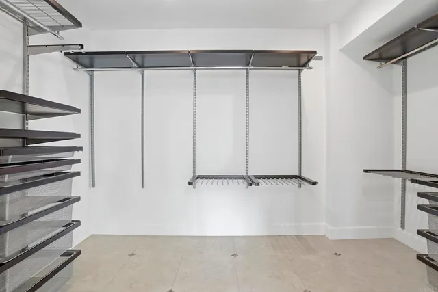 a view of an empty walk in closet