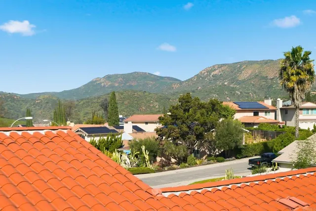 a view of a terrace with a garden and chair