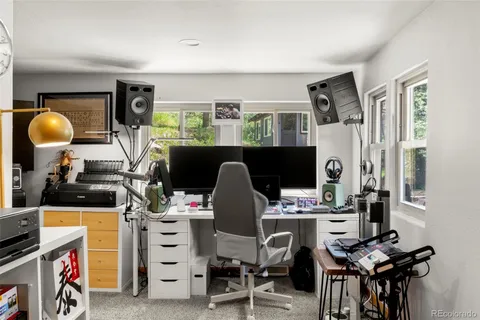 a view of a workspace with furniture