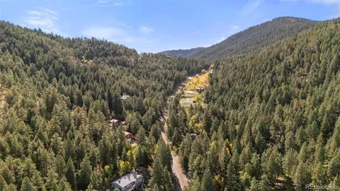 a view of mountain view with mountains in the background