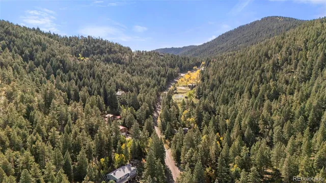 a view of mountain view with mountains in the background