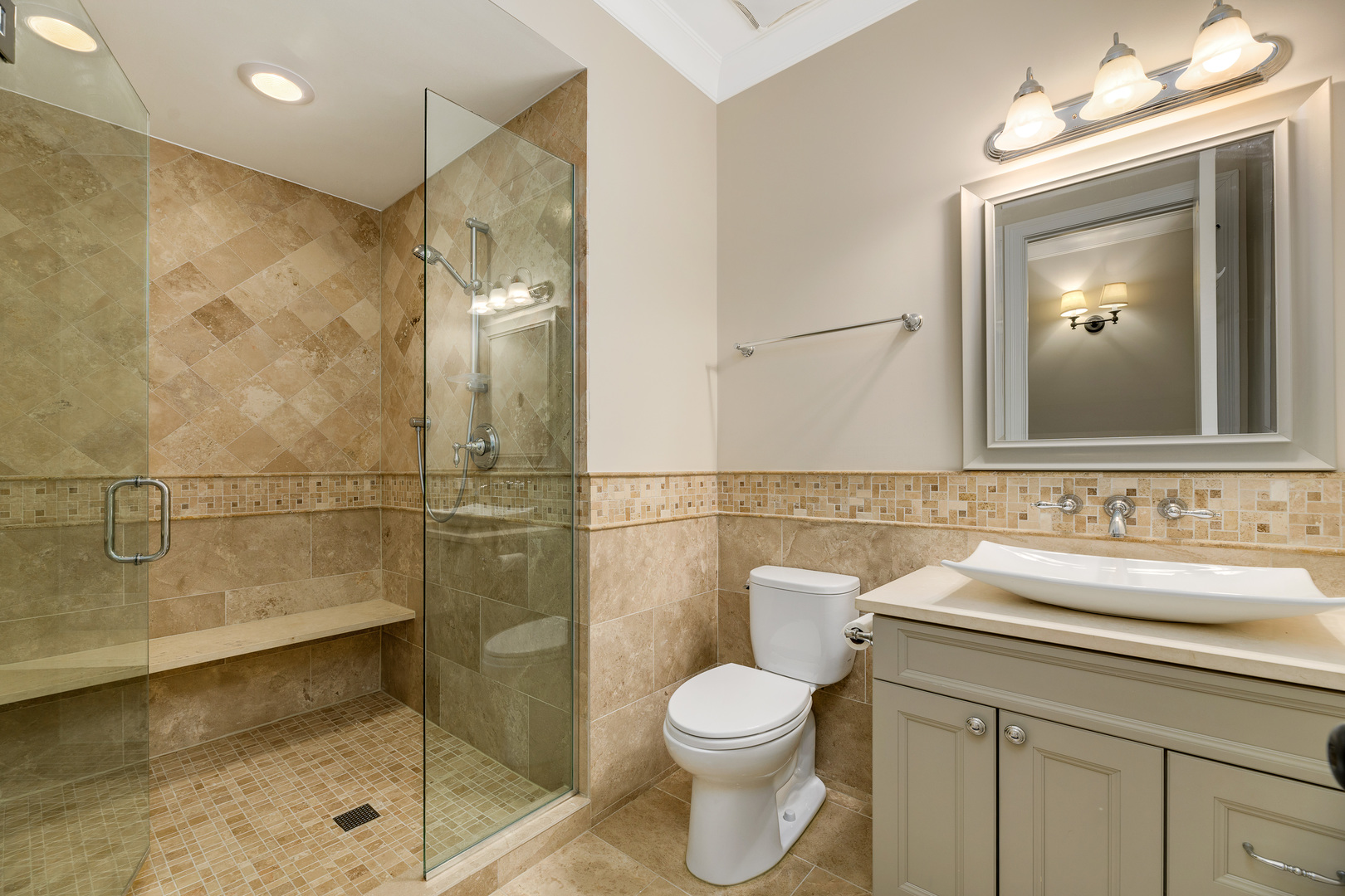 1734 West Fletcher Street Chicago, IL 60657 - Photo 15 of 34 a bathroom with a sink a toilet and shower