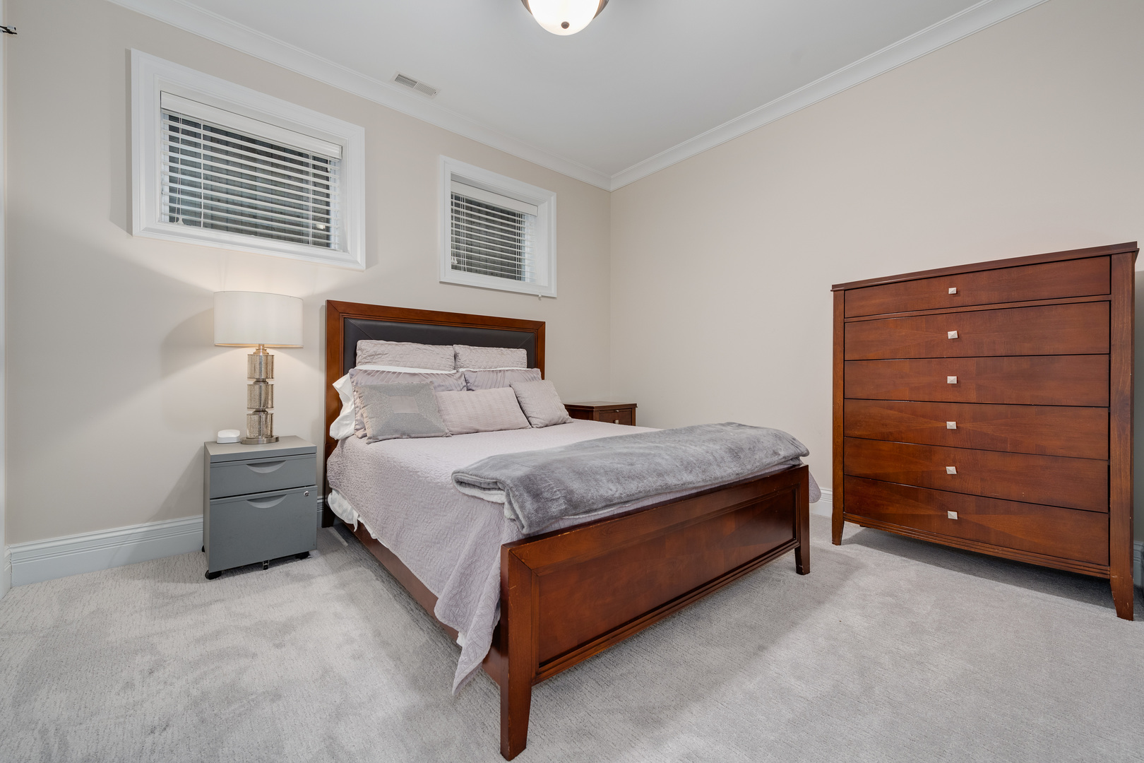 1734 West Fletcher Street Chicago, IL 60657 - Photo 16 of 34 a bedroom with a bed and a window