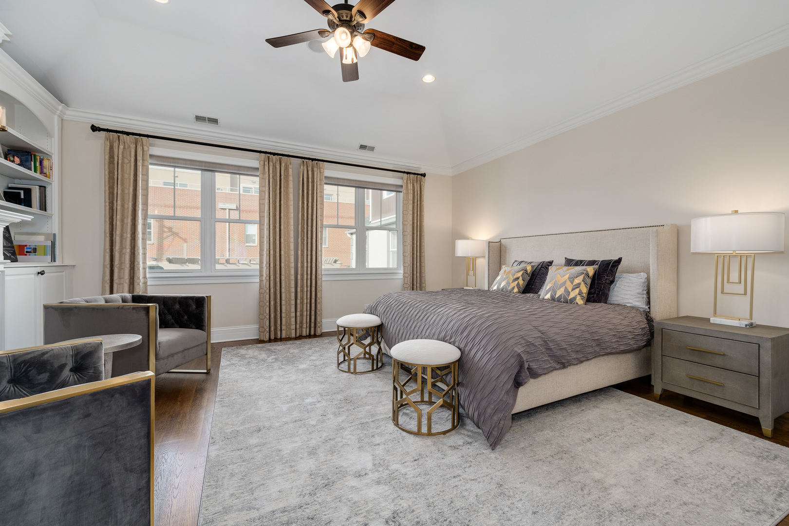 1734 West Fletcher Street Chicago, IL 60657 - Photo 19 of 34 a bedroom with a bed and a chandelier