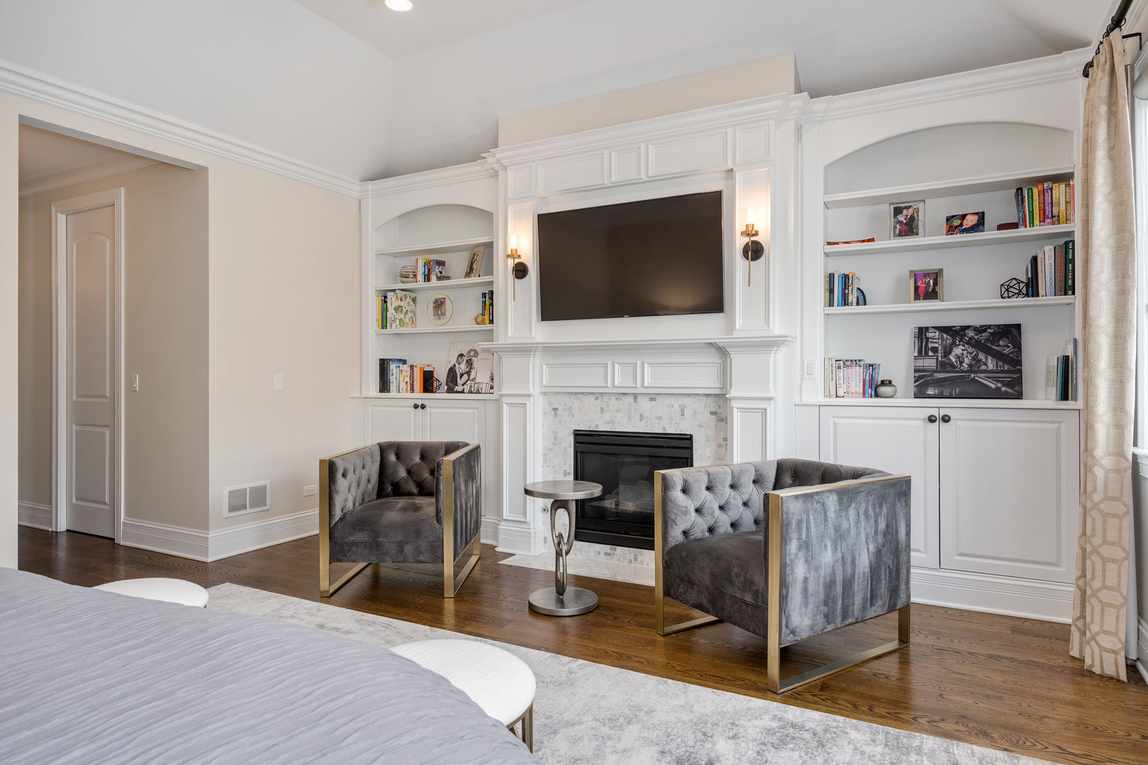 1734 West Fletcher Street Chicago, IL 60657 - Photo 20 of 34 a bedroom with a bed and a fireplace
