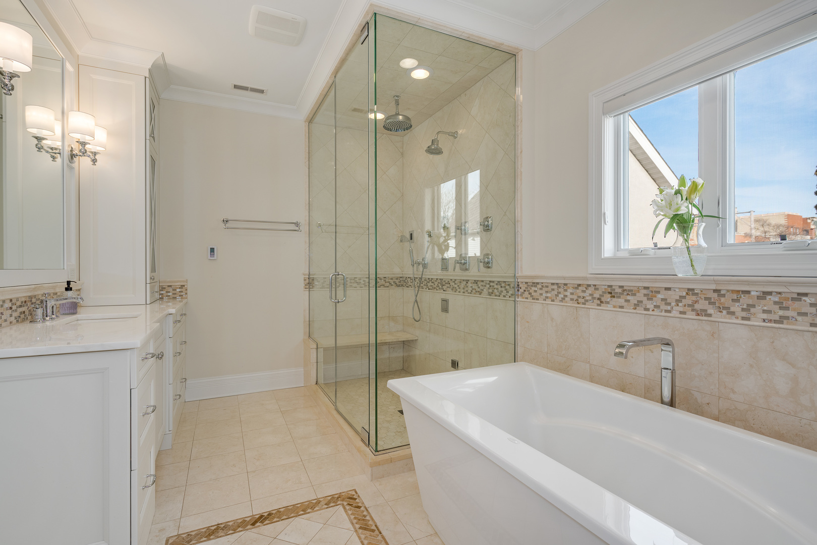 1734 West Fletcher Street Chicago, IL 60657 - Photo 21 of 34 a bathroom with a tub sink and mirror