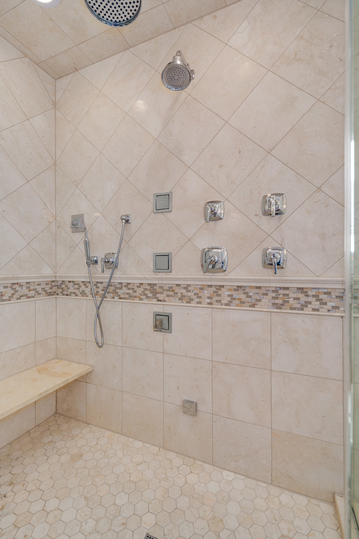 1734 West Fletcher Street Chicago, IL 60657 - Photo 22 of 34 a bathroom with a bathtub and shower