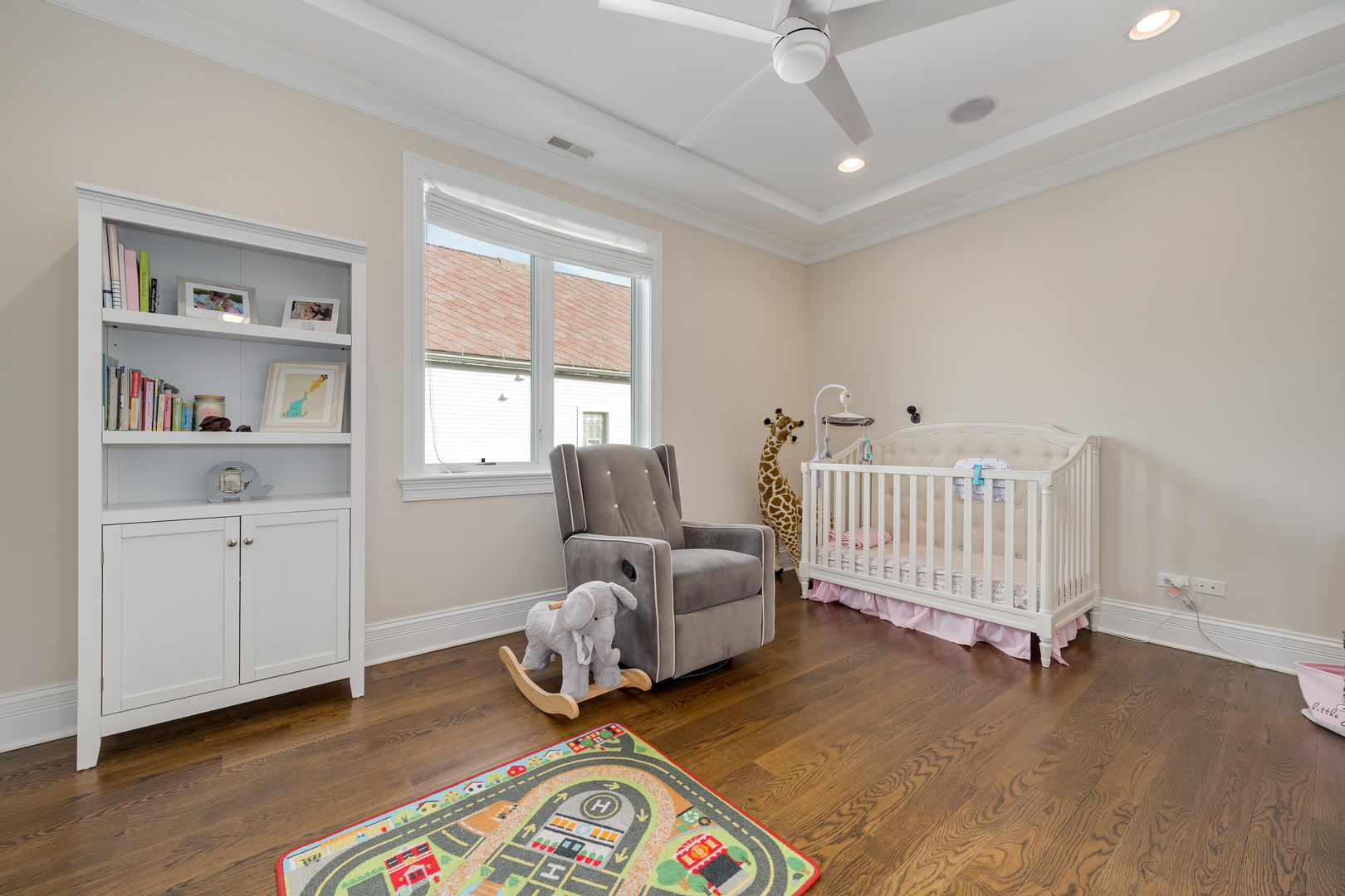 1734 West Fletcher Street Chicago, IL 60657 - Photo 25 of 34 a room with furniture and a wooden floor
