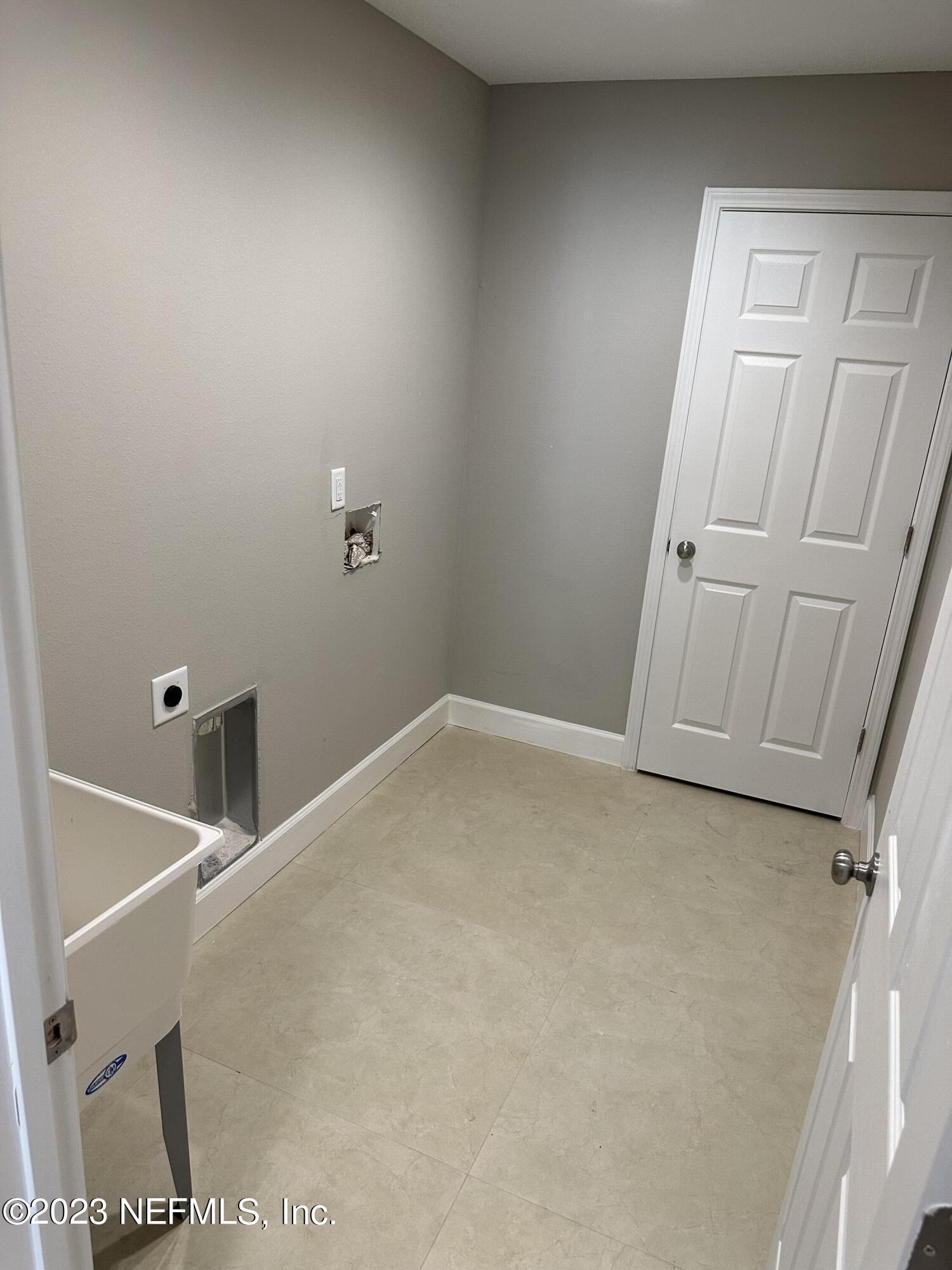 2829 Fleming Street Jacksonville, FL 32254 - Photo 20 of 24 a view of a room with racks on the wall