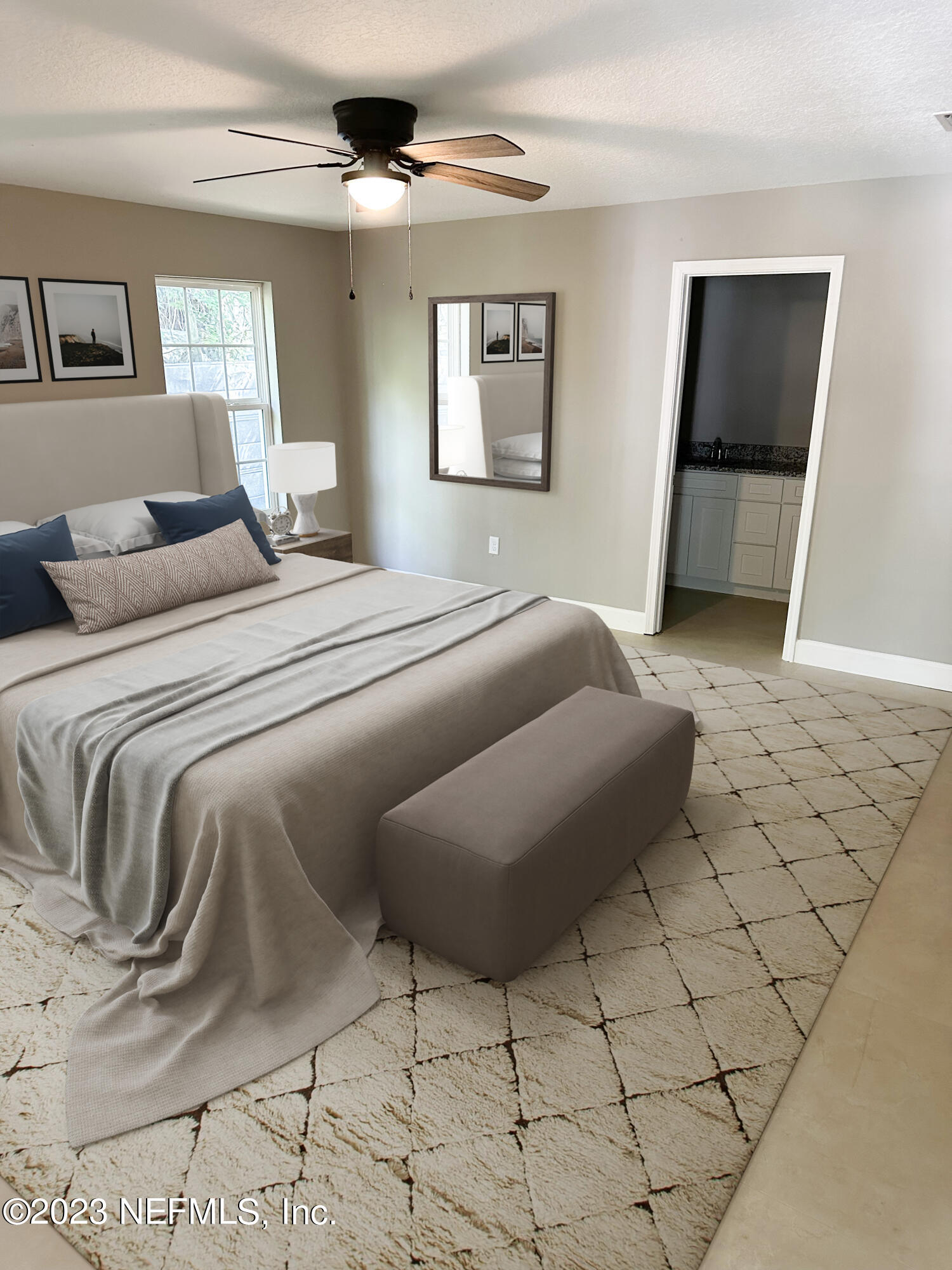 2829 Fleming Street Jacksonville, FL 32254 - Photo 23 of 24 a bedroom with a bed and a flat screen tv