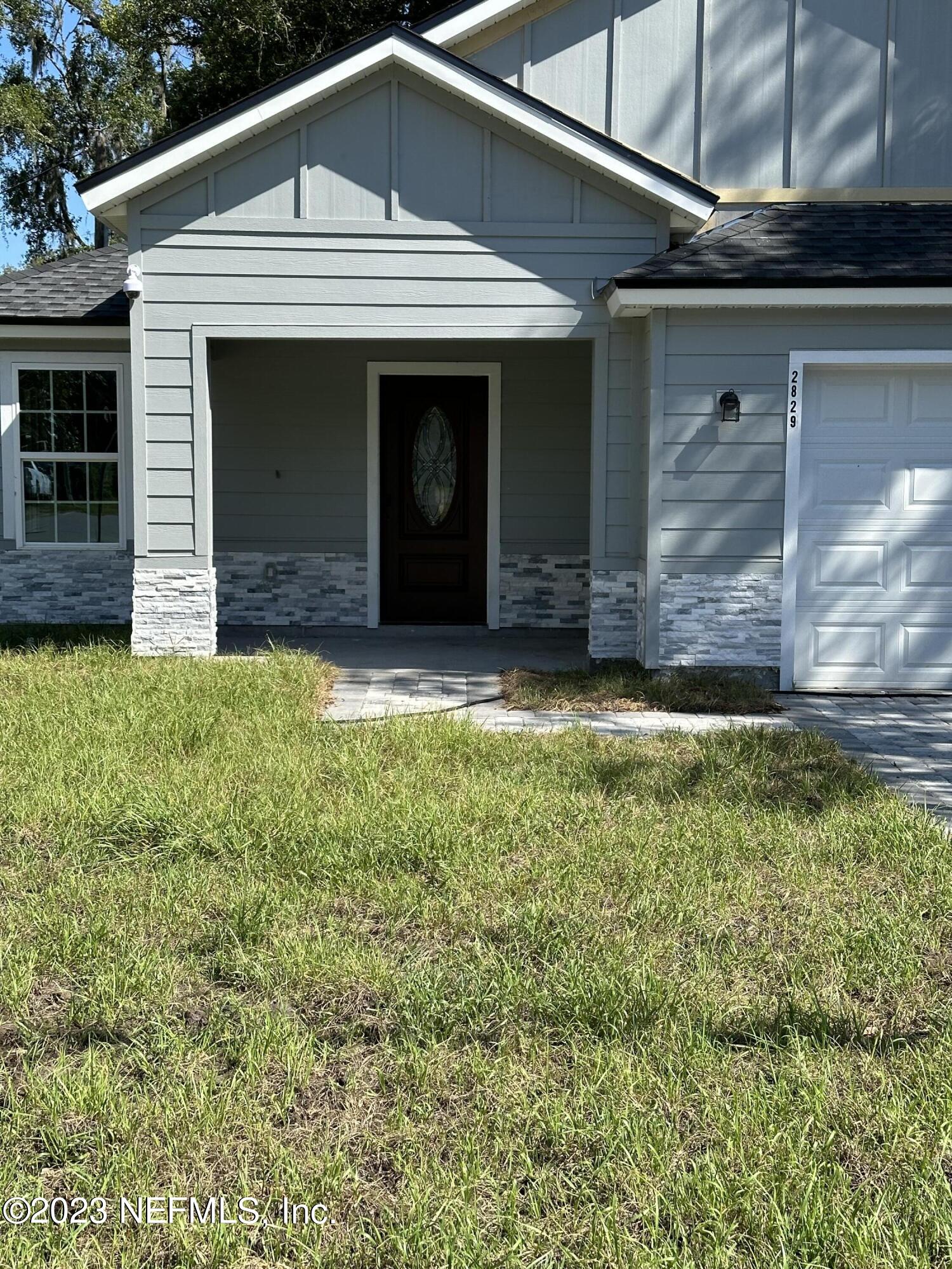 2829 Fleming Street Jacksonville, FL 32254 - Photo 5 of 24 a view of front door and yard
