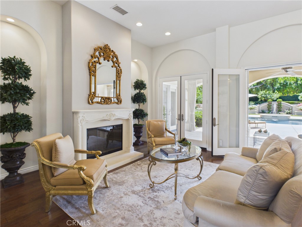 1662 Cherokee Road Corona, CA 92881 - Photo 14 of 60 Formal living room with gas fireplace.