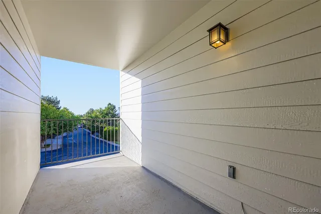 a view of a door and a window