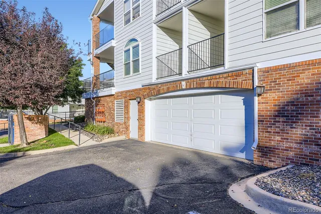 a view of a house with a garage