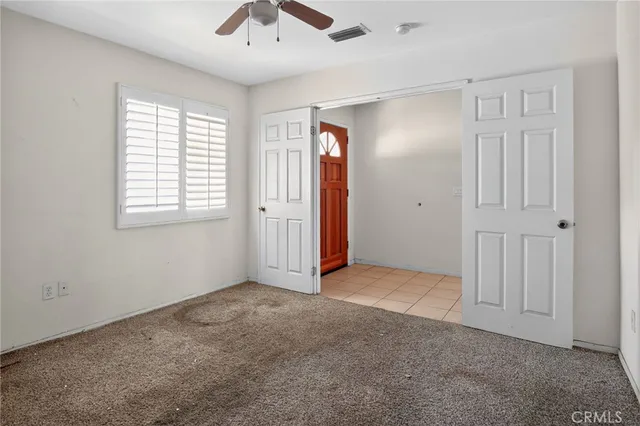 a bathroom with a bathtub and a window