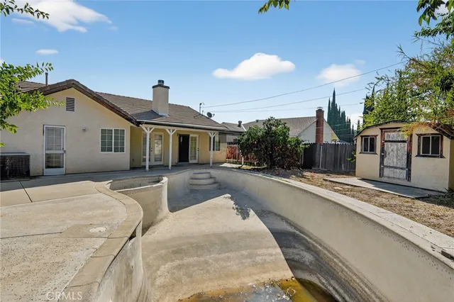 a front view of a house with yard