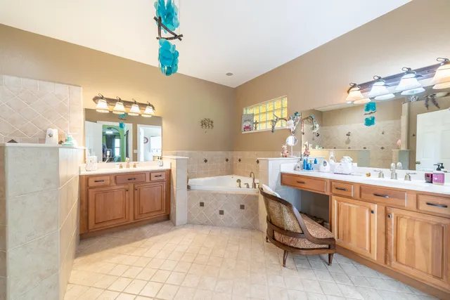 a view of a porch with a table and chairs
