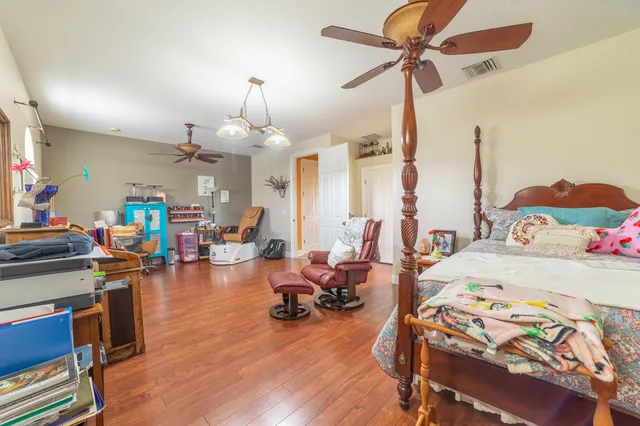 a view of a swimming pool with a yard