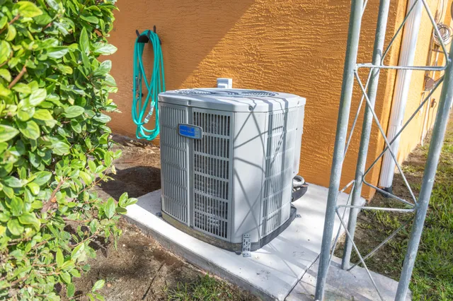 a kitchen with a refrigerator a stove a sink a washer dryer and a refrigerator