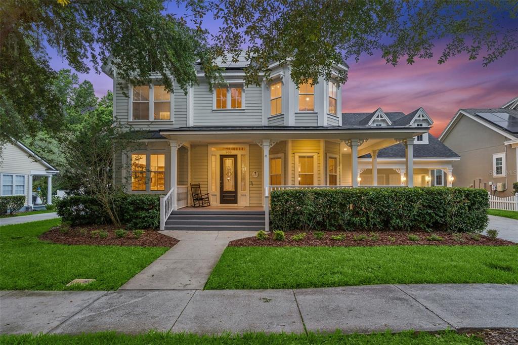 908 Croton Road Celebration, FL 34747 - Photo 2 of 86 a front view of a house with yard and green space