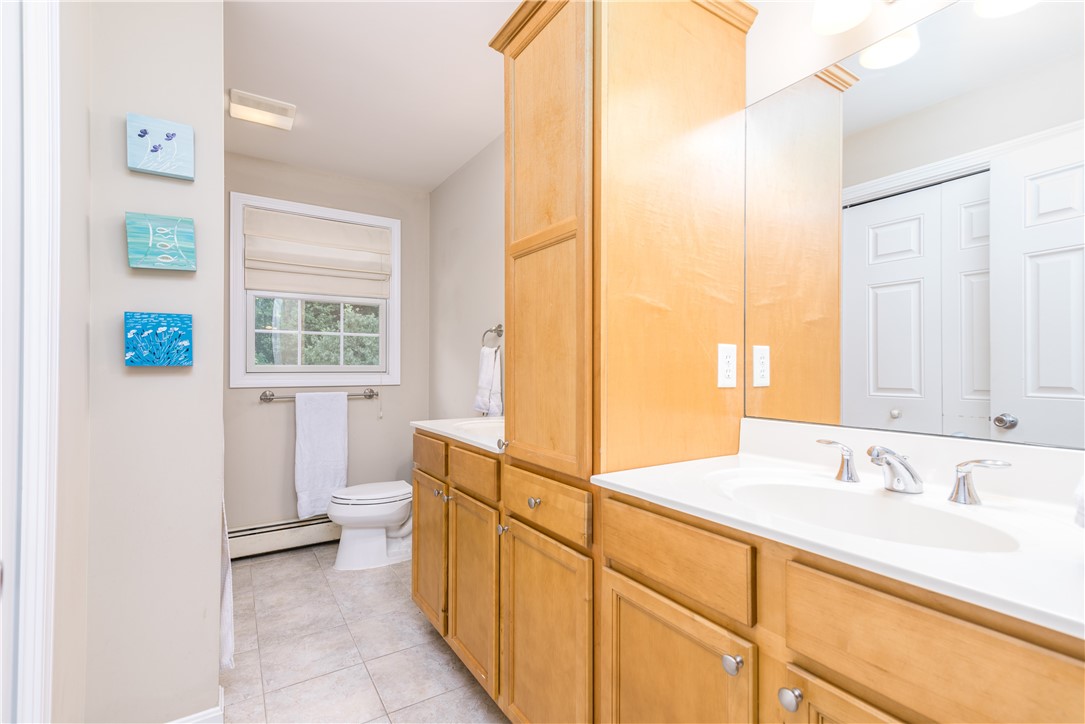 71 Wampum Road Narragansett, RI 02882 - Photo 19 of 27 Upper floor bath with two sinks.
