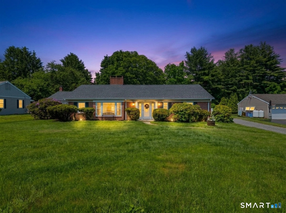 235 Scotland Road Norwich, CT 06360 - Photo 30 of 31 a front view of house with yard and trees in the background