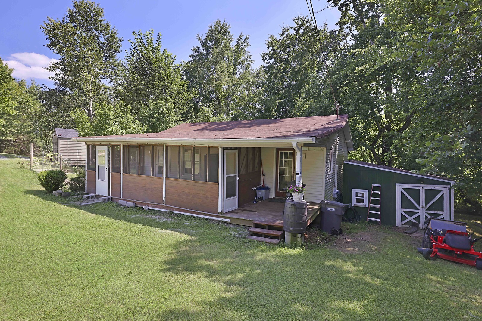 420 East Biggs Road Portland, TN 37148 - Photo 3 of 36 a view of a house with a yard porch and sitting area