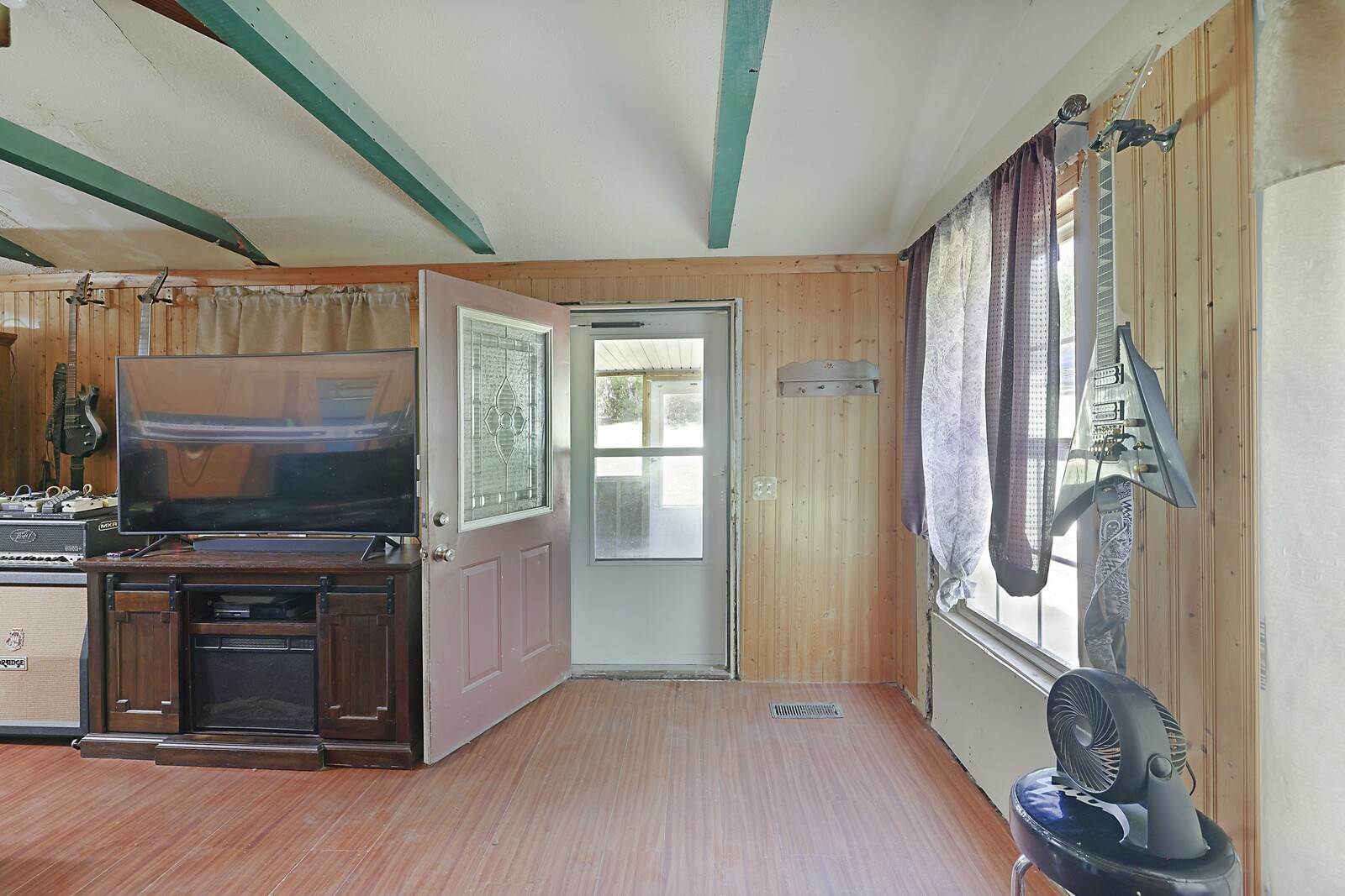 420 East Biggs Road Portland, TN 37148 - Photo 7 of 36 a view of a kitchen with a sink fire place and a window
