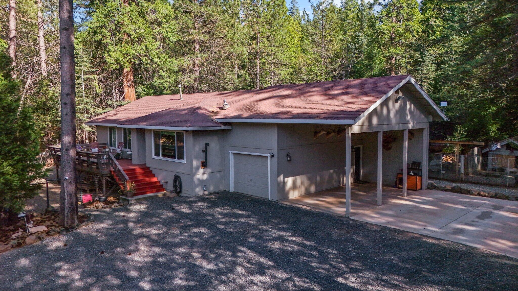 30726 Shingletown Ridge Road Shingletown, CA 96088 - Photo 1 of 84 a front view of a house with a porch