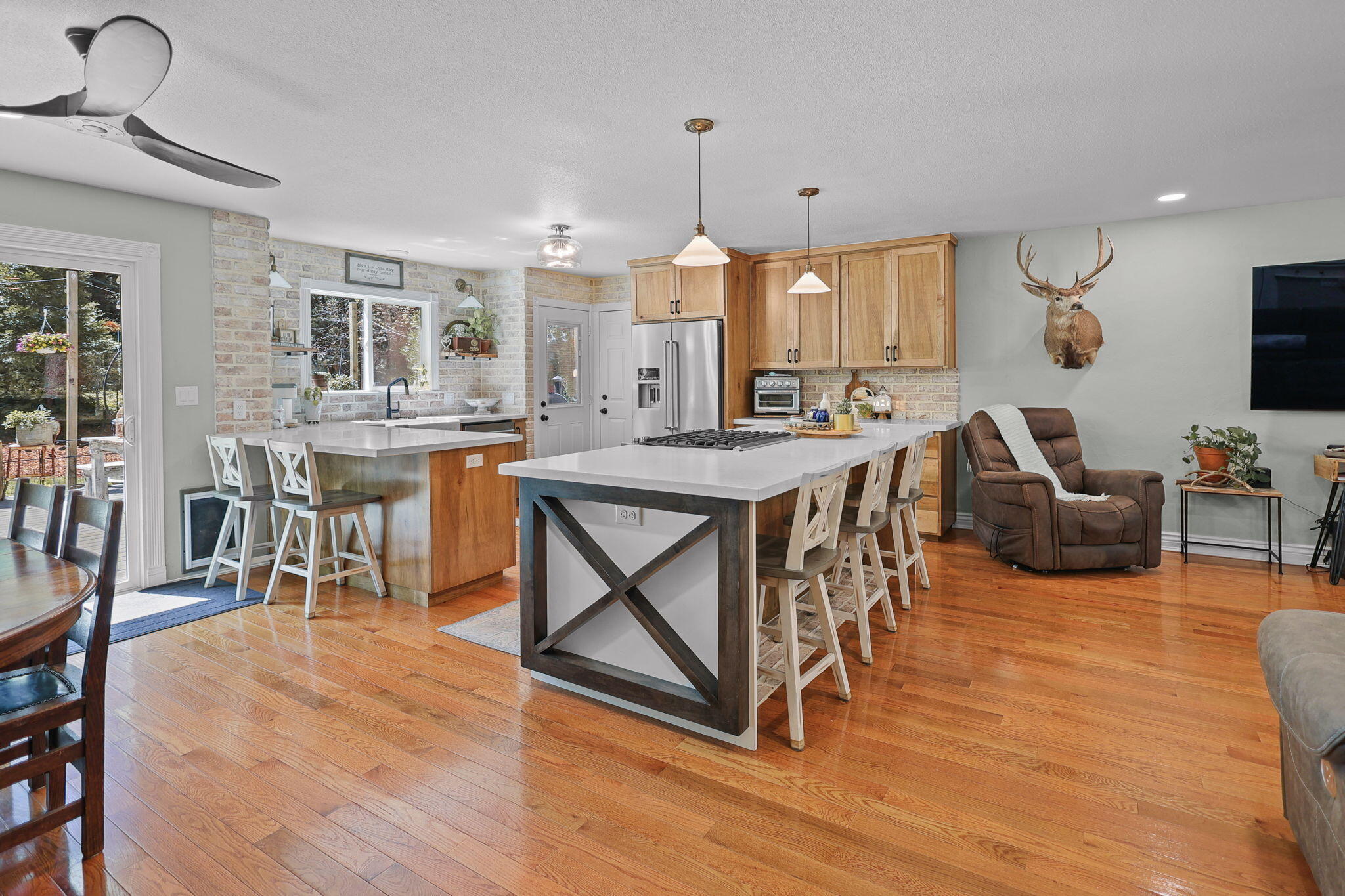 30726 Shingletown Ridge Road Shingletown, CA 96088 - Photo 13 of 84 a view of a dining room with furniture window and wooden floor
