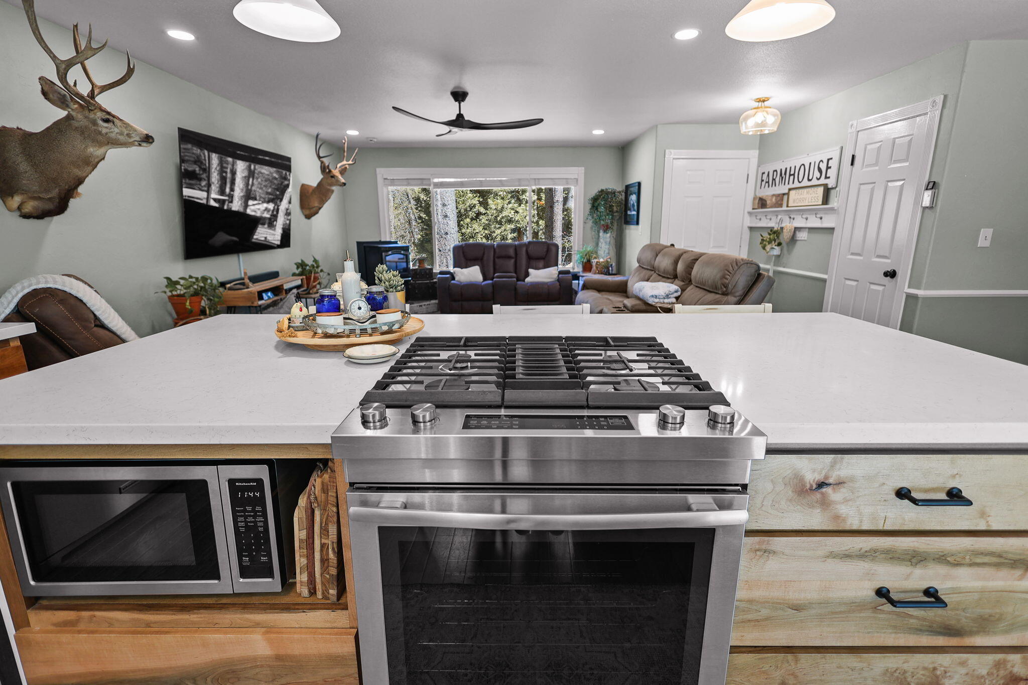 30726 Shingletown Ridge Road Shingletown, CA 96088 - Photo 14 of 84 a kitchen with stove and chairs