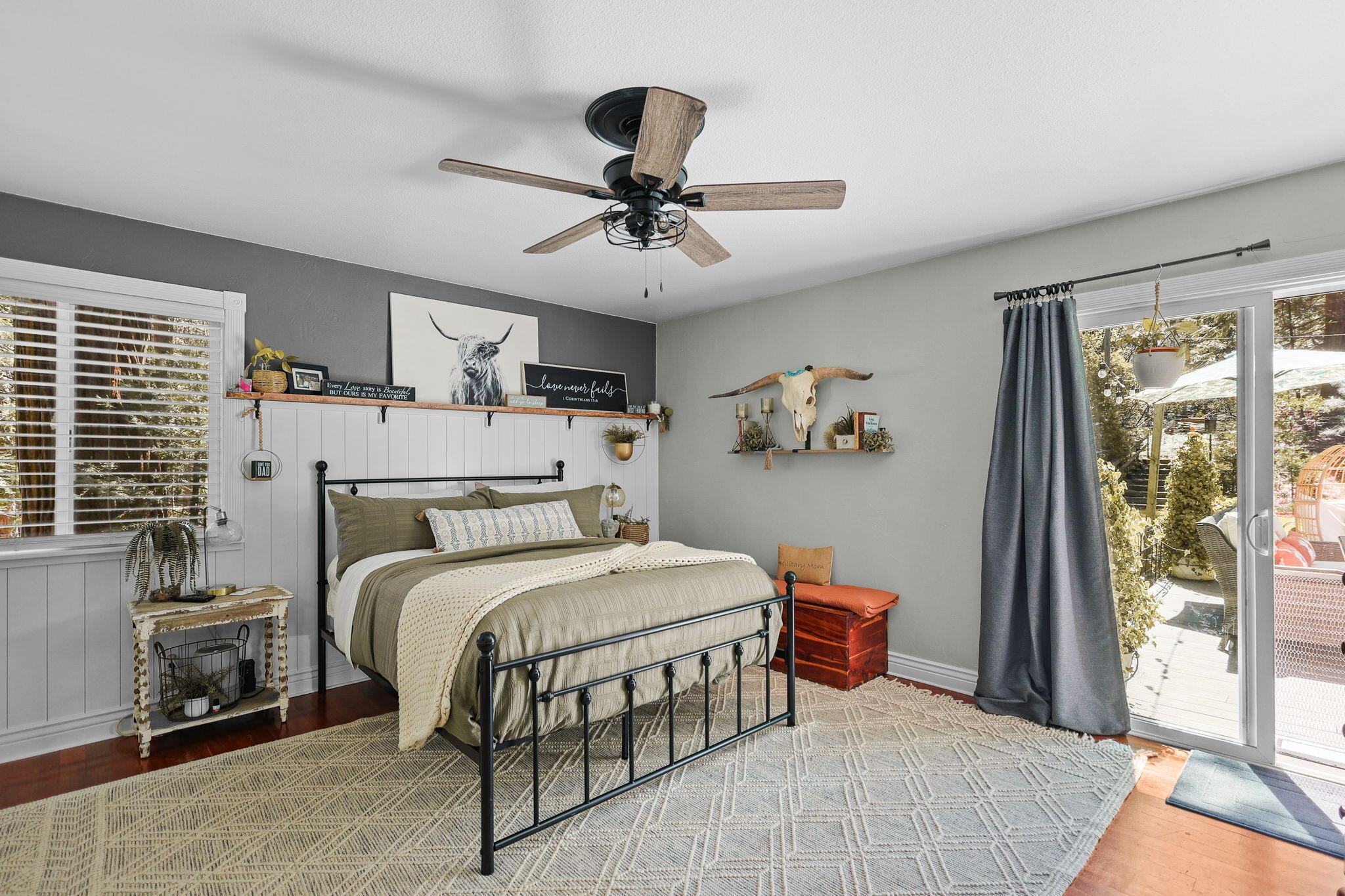30726 Shingletown Ridge Road Shingletown, CA 96088 - Photo 25 of 84 a bedroom with a bed and a chandelier