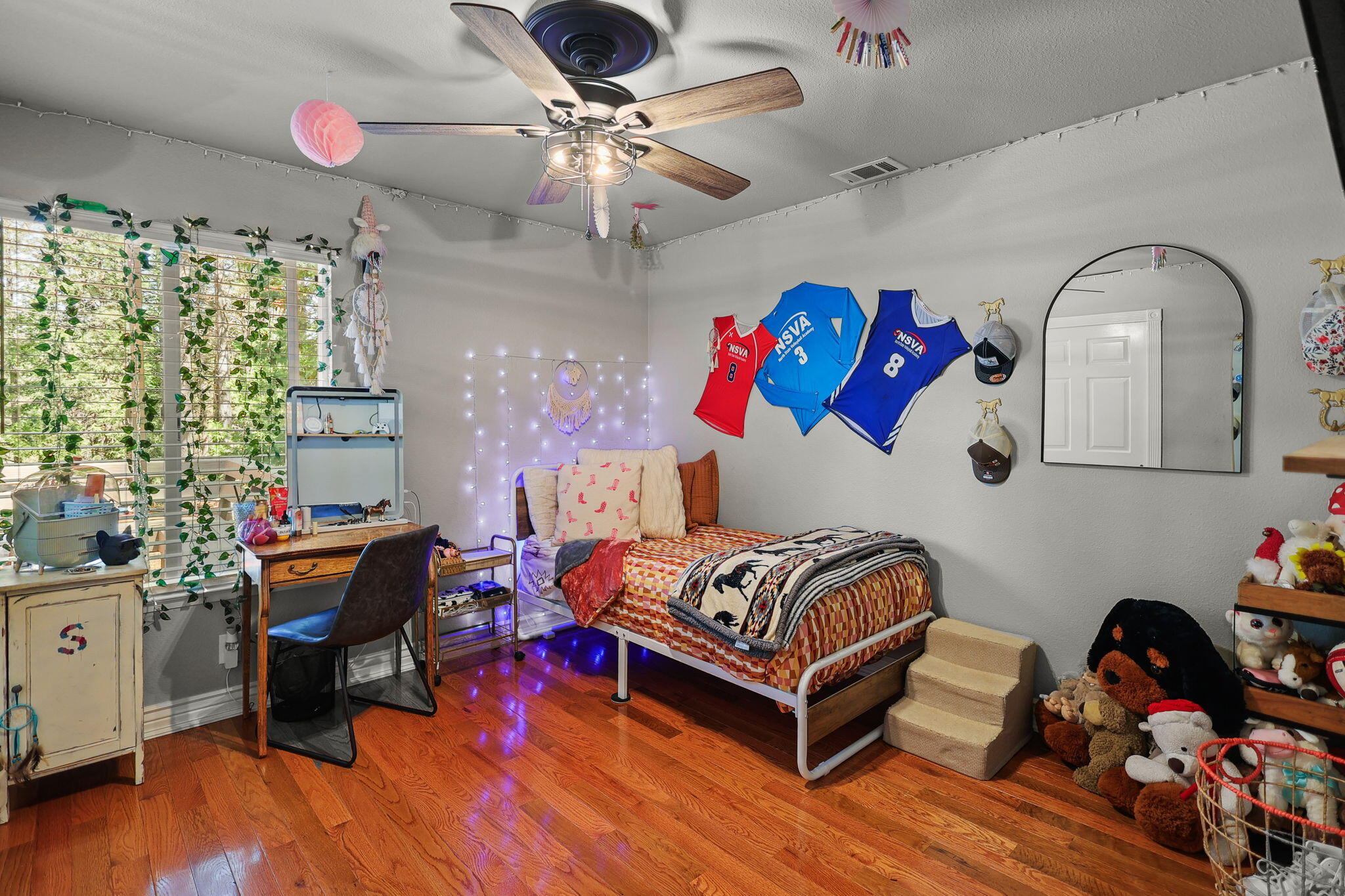 30726 Shingletown Ridge Road Shingletown, CA 96088 - Photo 26 of 84 a bedroom with furniture and a chandelier