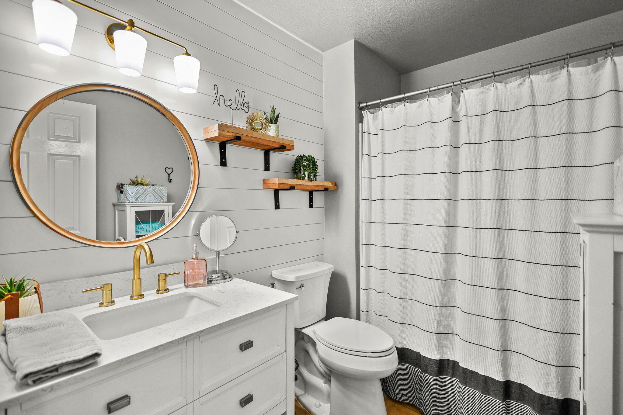 30726 Shingletown Ridge Road Shingletown, CA 96088 - Photo 27 of 84 a bathroom with a sink a toilet and a mirror