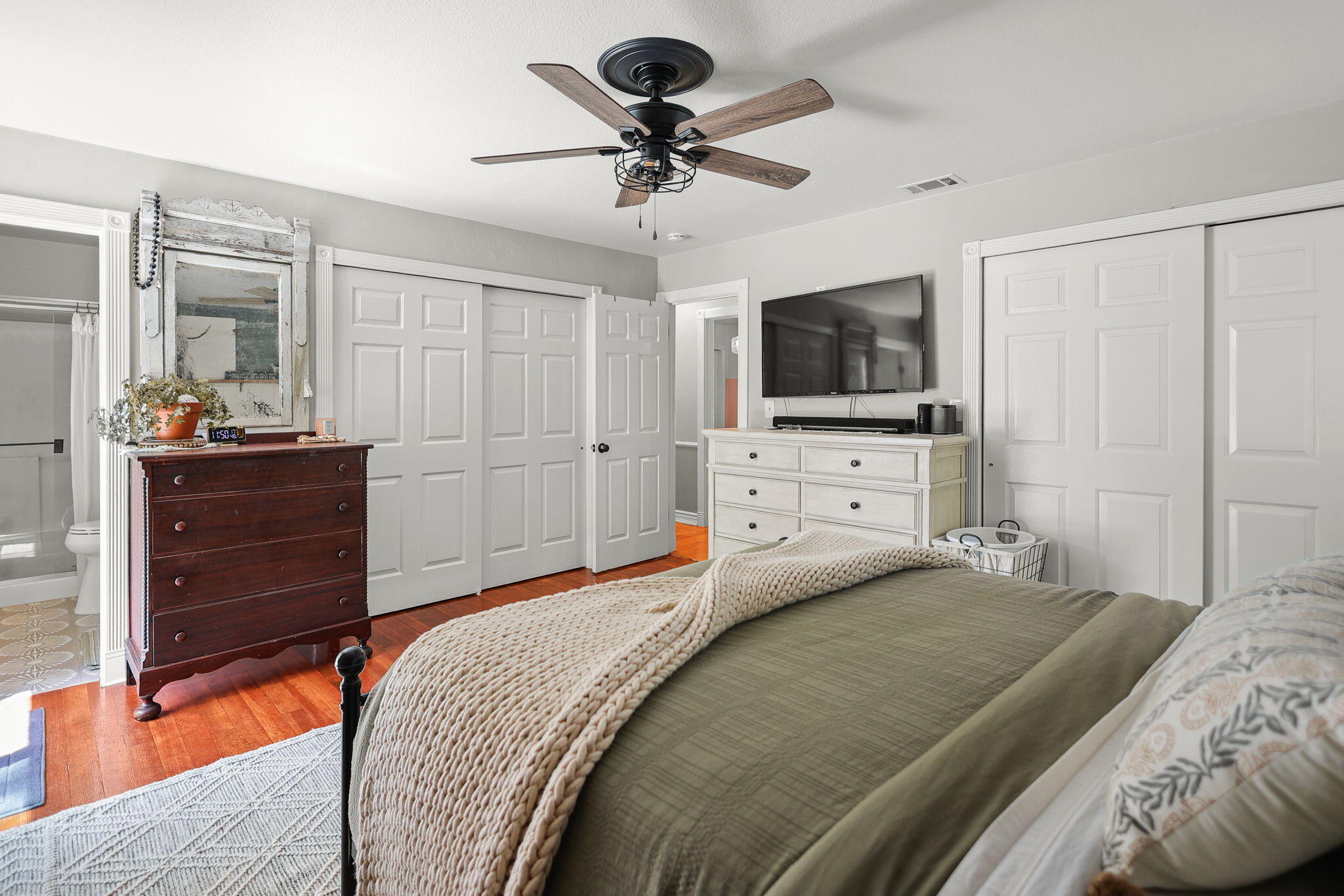 30726 Shingletown Ridge Road Shingletown, CA 96088 - Photo 28 of 84 a bedroom with a bed and a flat screen tv