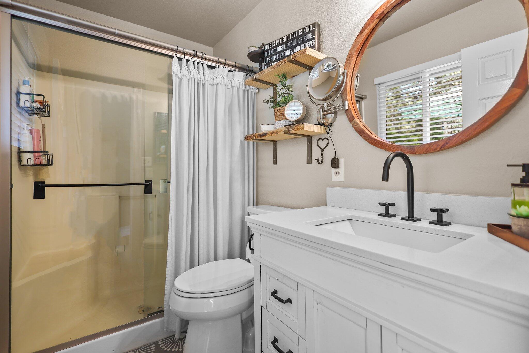 30726 Shingletown Ridge Road Shingletown, CA 96088 - Photo 29 of 84 a bathroom with a sink toilet and shower