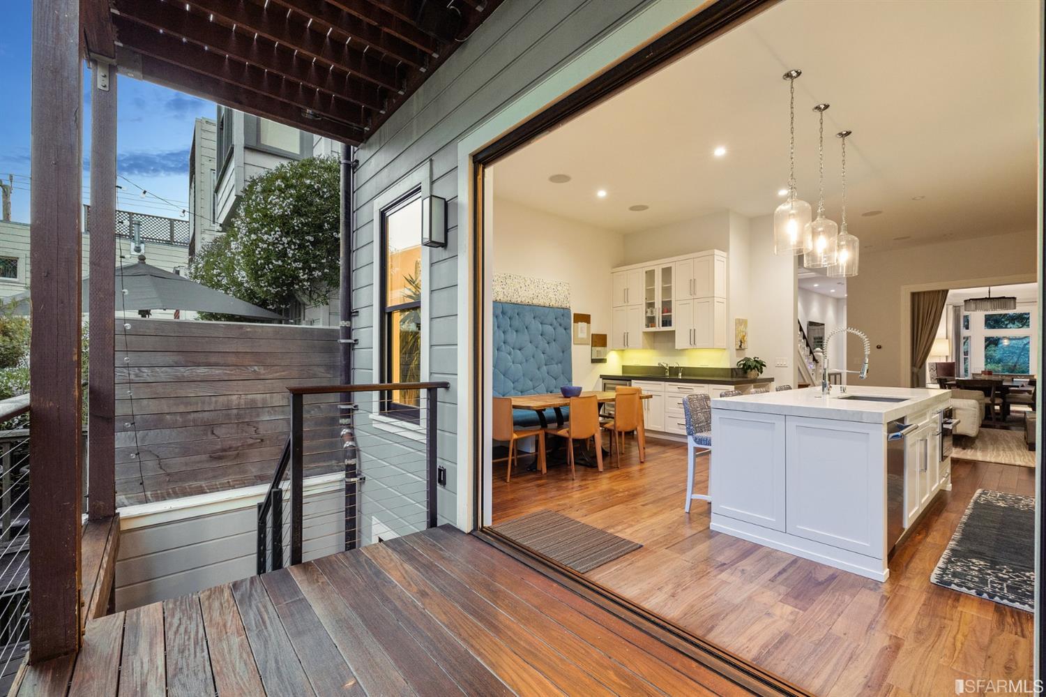 Clay Street San Francisco, CA 94115 - Photo 14 of 90 Nana door opens completely to allow for an easy in and out from the kitchen to the deck and yard below.