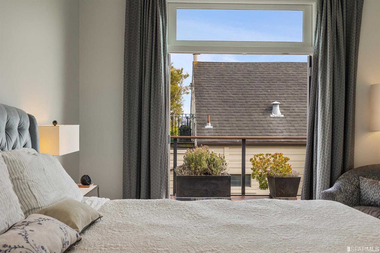 Clay Street San Francisco, CA 94115 - Photo 43 of 90 Outlook from the primary bedroom to the rear deck. Lots of light.