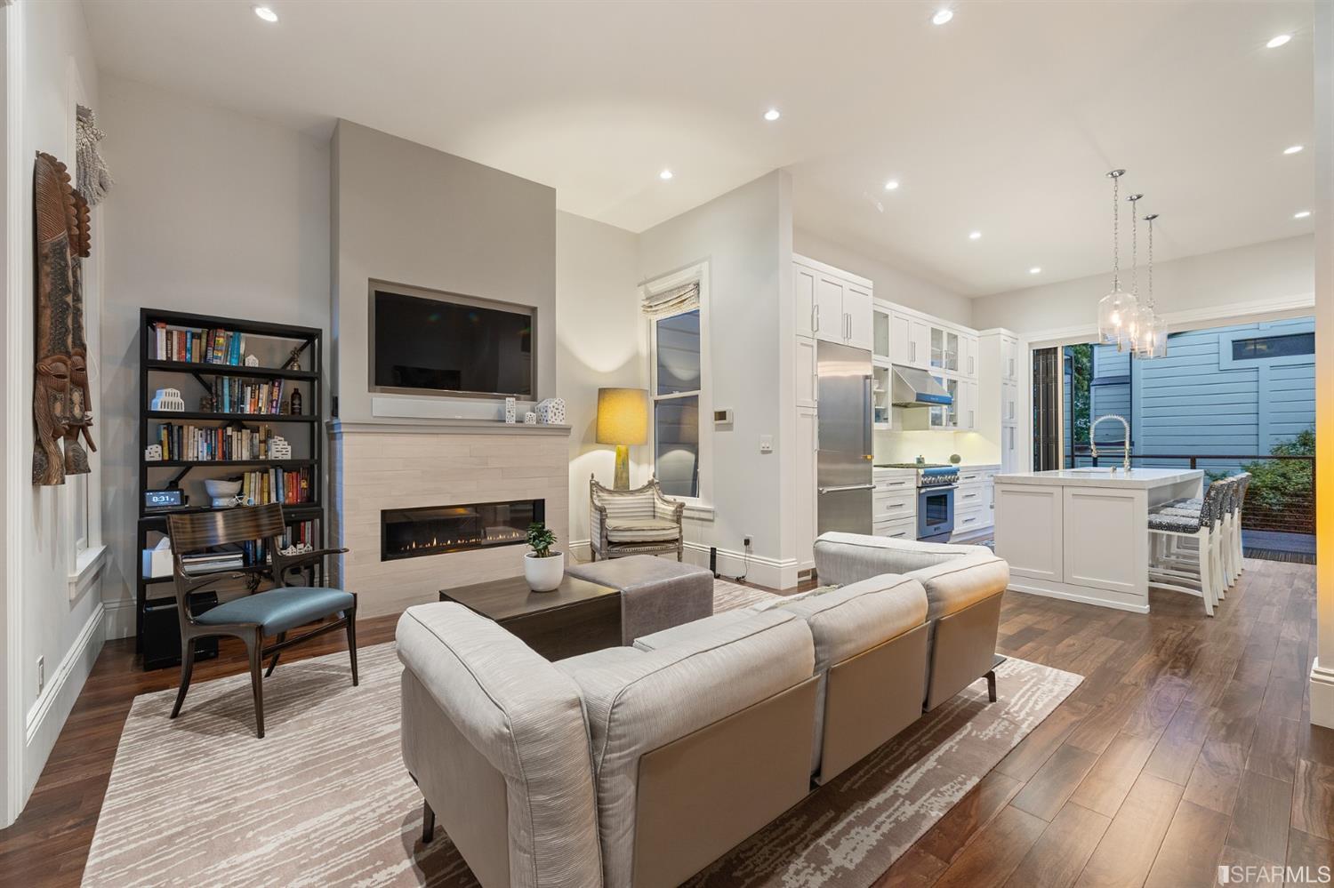 Clay Street San Francisco, CA 94115 - Photo 8 of 90 Family room with gas fireplace and direct access to the kitchen and the dining area. Very bright and homey.