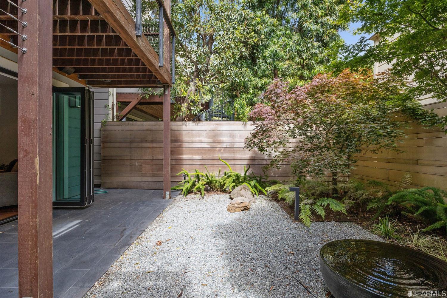 Clay Street San Francisco, CA 94115 - Photo 81 of 90 Lower level yard with Japanese maple trees and water feature.