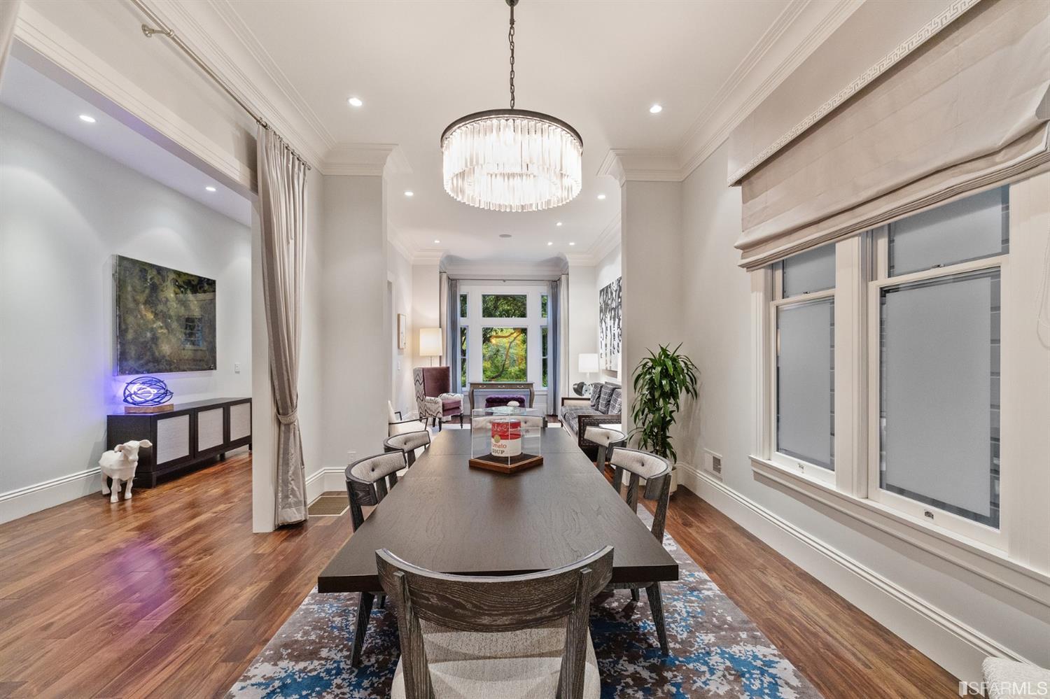 Clay Street San Francisco, CA 94115 - Photo 10 of 90 The dining room is open to the living and family room. Curtains can be pulled for a more cozy dining experience.